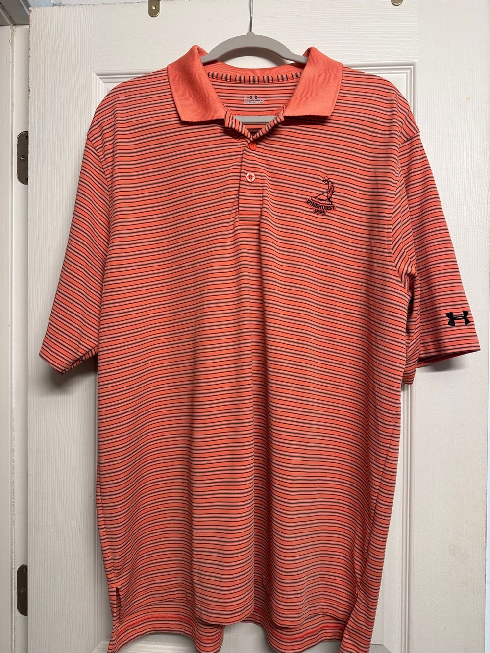 Under Armour Men's Coral and Navy Striped Performance Polo Pinehurst logo